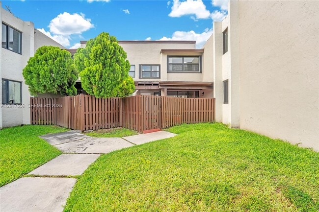 Building Photo - 10296 NW 9th St Cir Unit 103
