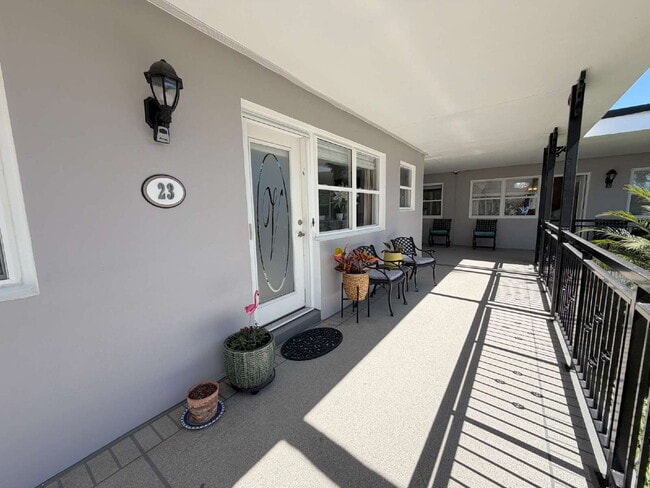 Building Photo - "Charming 1-Bedroom Condo Retreat in Dunedin's Heart - Cozy, Convenient & Inviting!" Unit #23