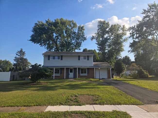 Building Photo - Freshly painted throughout is this 4-bedro... Rental