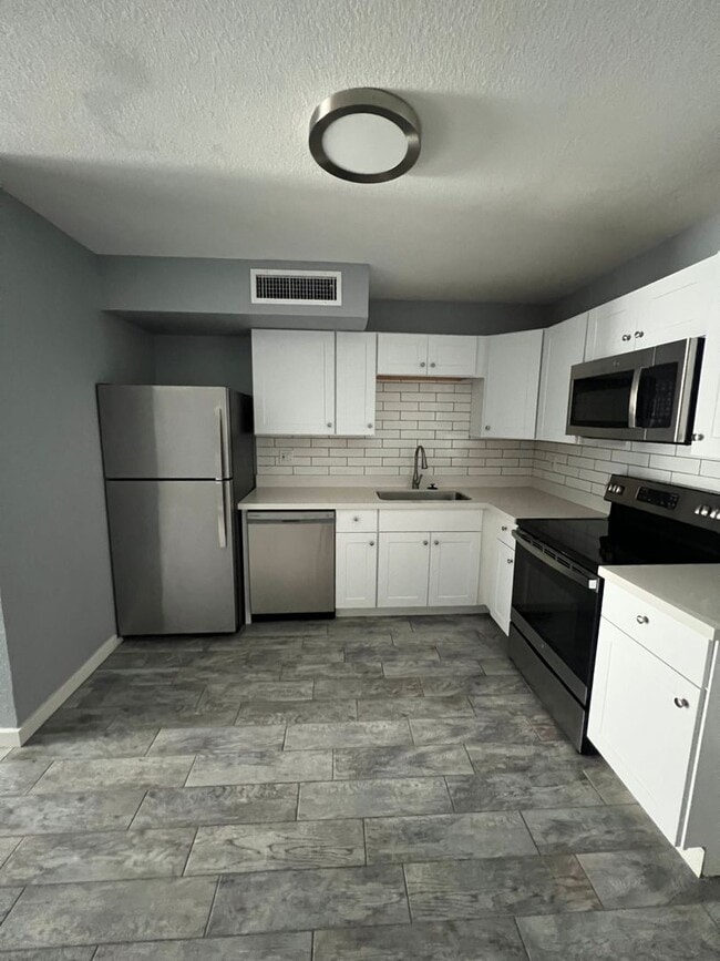 Photo - NEWLY REMODELED UNIT IN SURPRISE WITH BACK YARD