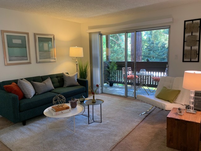 Living Room/Balcony - Meadow Wood Apartments