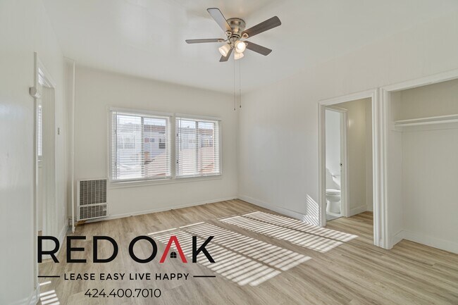 Photo - Welcoming Studio with Large Windows, Hardw... Unit 311