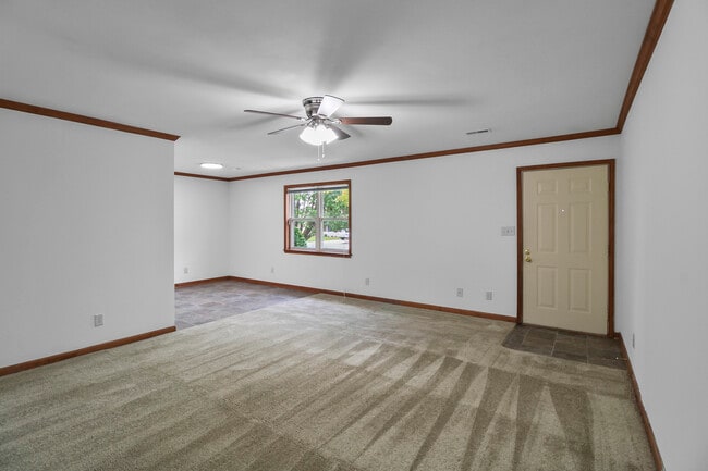 Living Area and Dining Area (Vinyl in Dining May Look Different)