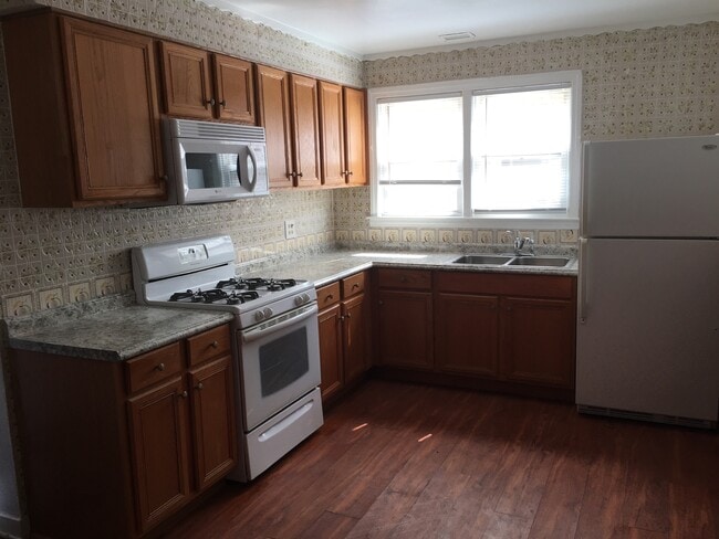 Building Photo - 8950 Bronx Ave Unit 1N