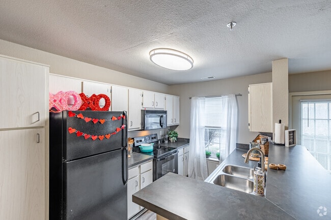 4BR, 2BA - 1,076SF - Kitchen