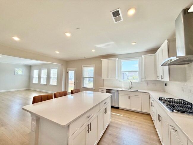 Photo - Luxurious 5BD, 4.5BA Holly Springs Home in an HOA Community with Resort-Style Amenities near Down...
