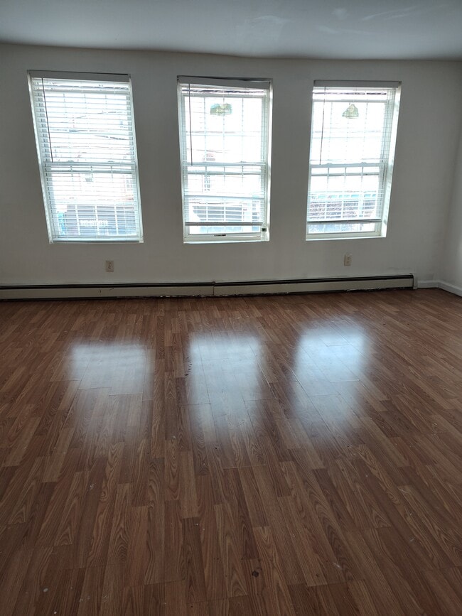Living room - 12 W Main St Unit Apartment #2