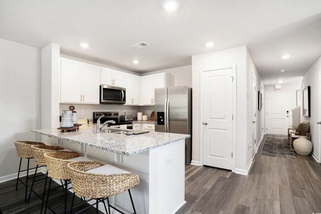 Building Photo - The Townes at Amber Bluff