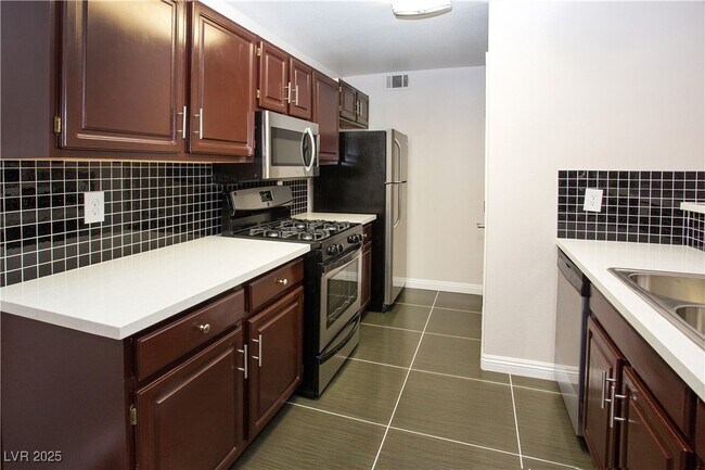 Building Photo - 5125 W Reno Ave Unit 000 Rental