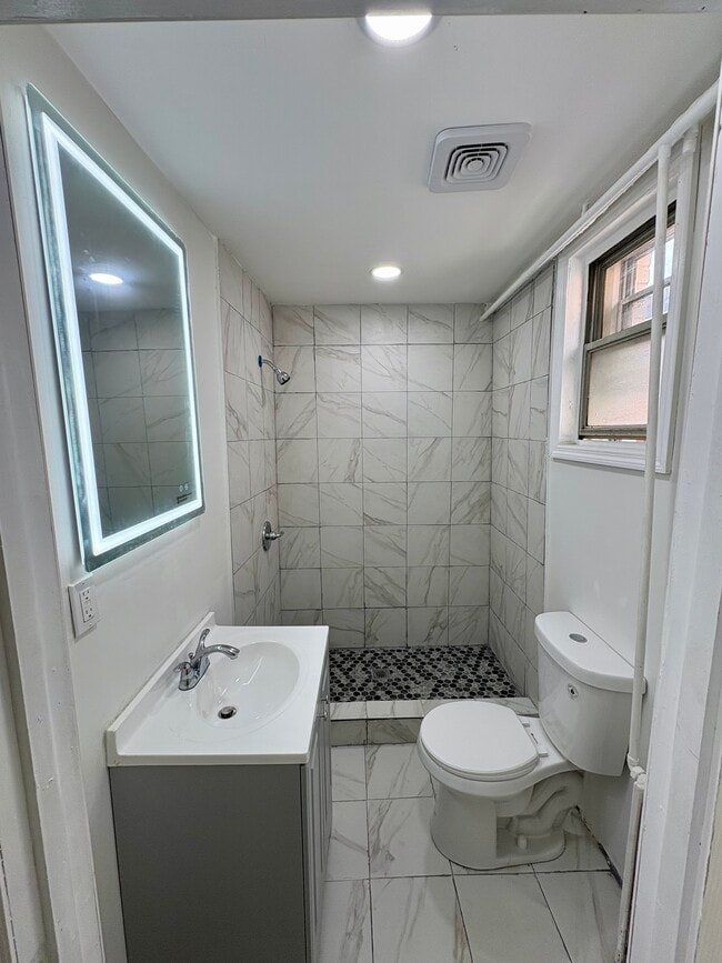Building Photo - 6709 Meadowview Ave Unit 1