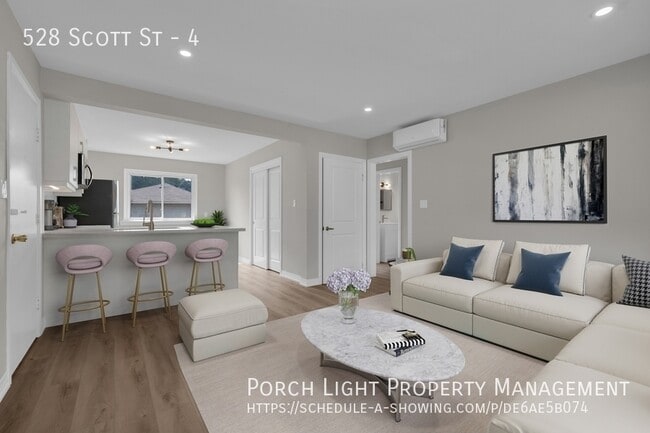 Photo - Private Laundry. Private AC. Balcony. Available Parking. Modern Renovations. Excellent location. Unit 4