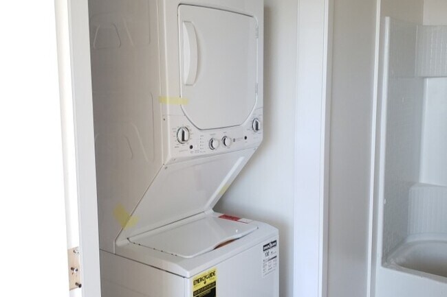 Unidad con lavadora/secadora - Live Oak Crossing