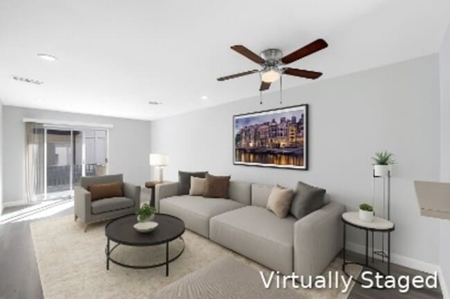 Building Photo - 1206 Hi Stirrup Unit #305