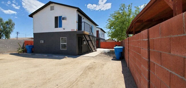 front of unit 1 and 2 ( 2 is upstairs) - 2525 E Monroe St