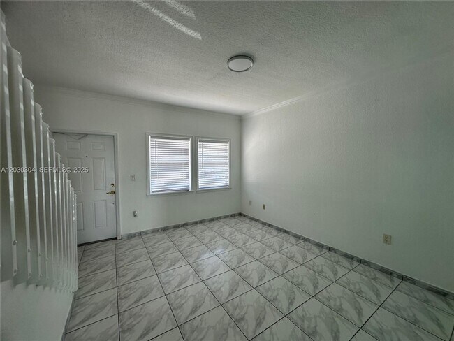 Photo - 9837 W Okeechobee Rd