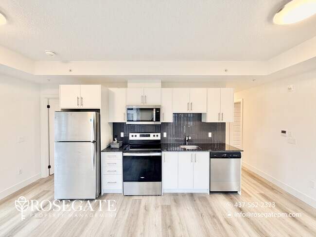 Photo - Modern Corner Condo with Balcony, Parking ... Unit 416
