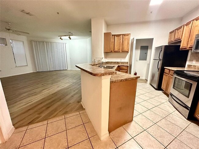 Photo - 6157 Metrowest Blvd Unit 208