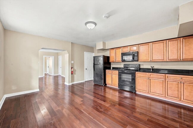 Building Photo - 2111 Orthodox St Unit 1