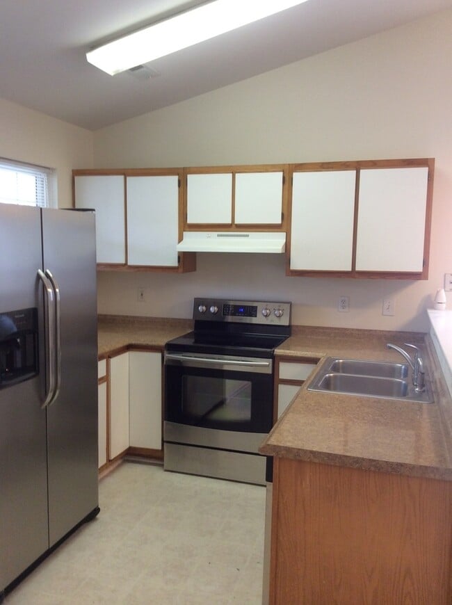 Photo - Updated flooring, McClelland Town homes 2BR/2Bath one level patio home, with back court yard! Clo...
