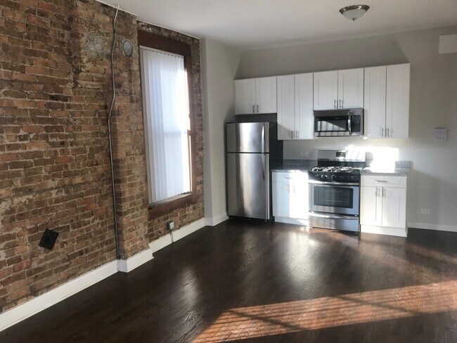 Photo - 1447 W 17th St Apartments