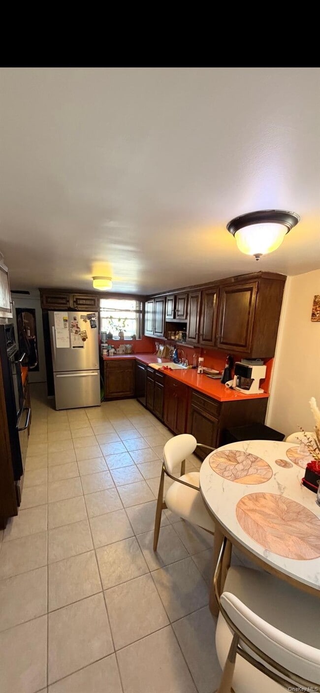 Photo - 60-46 69th Pl Unit Ground floor