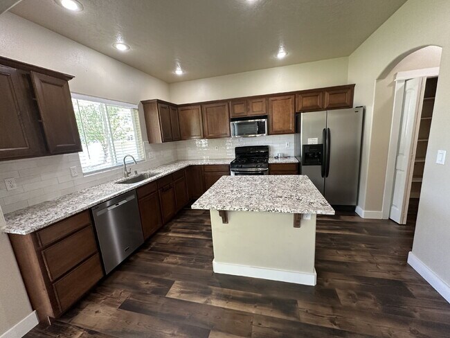 Photo - "Charming 4-Bed Home with Granite Accents & Hardwood Elegance in Meridian!"