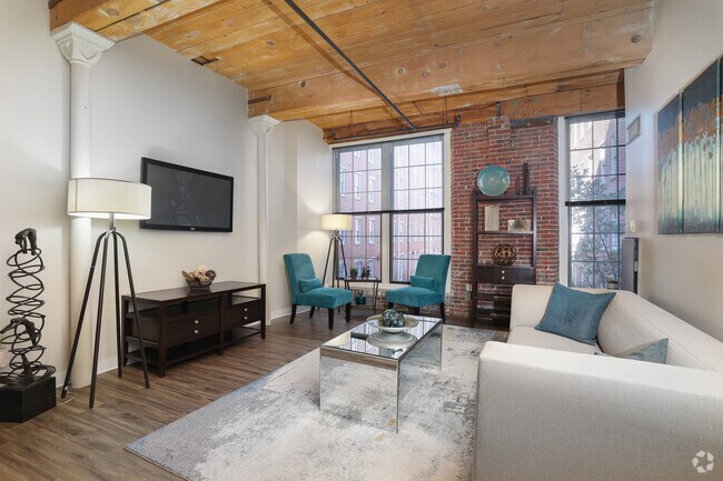 1BR, 1BA - 888SF - Living Room - The Apartments at Boott Mills