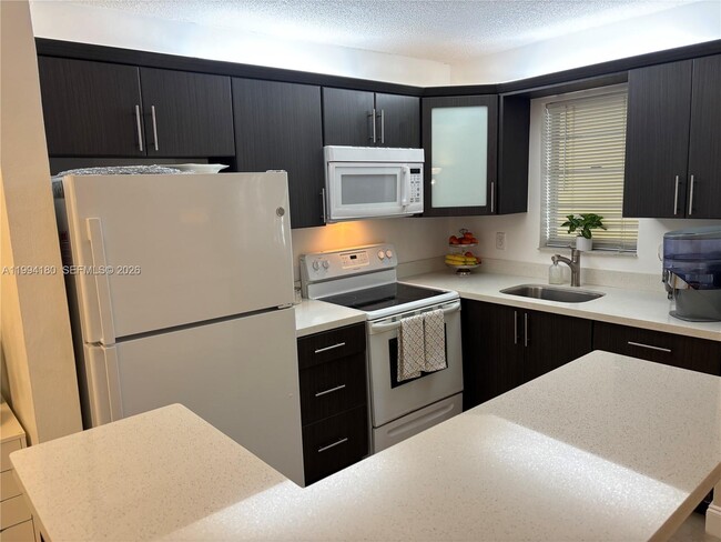 Photo - 1551 N 12th Ct Unidad 12A