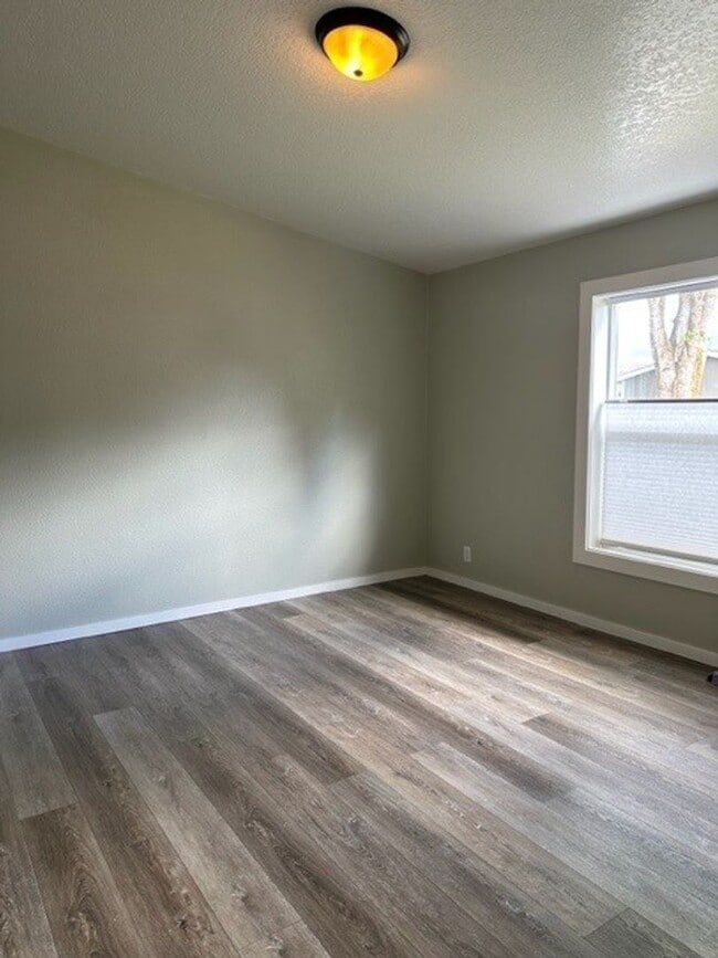 Photo - FREE RENT AND $1,000 SECURITY DEPOSIT - Single Level Updated Home w/ Spacious Yard and Loads of S...