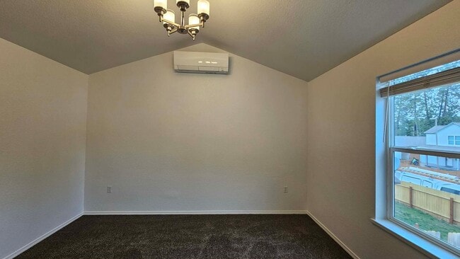 Photo - House with fenced yard and garage