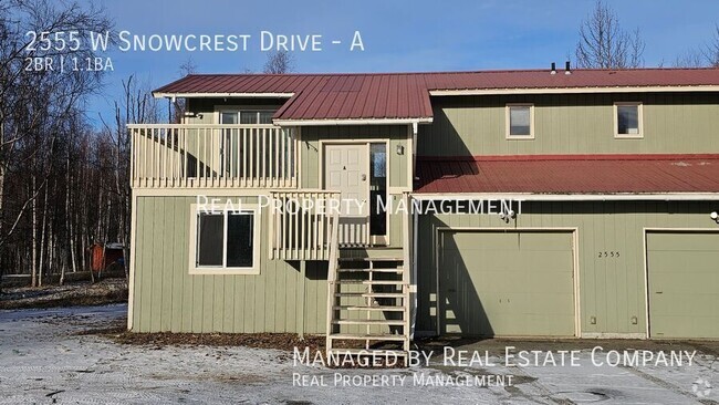 Building Photo - Townhome Style Two Bed with Garage and Yard Unit A