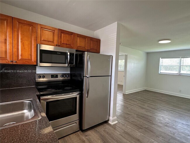Building Photo - 5661 SW 36th Ct Unit 205 Rental