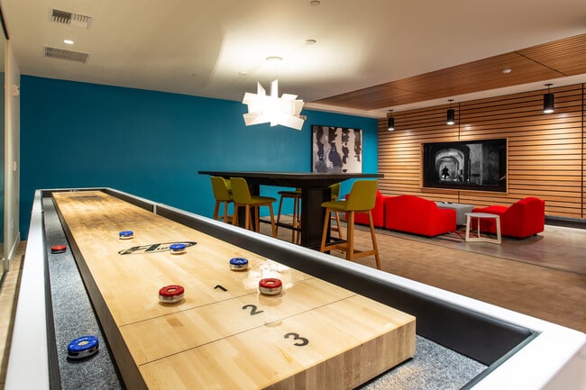 Shuffleboard and a Conference Table with outlets - Vertex Off Broadway