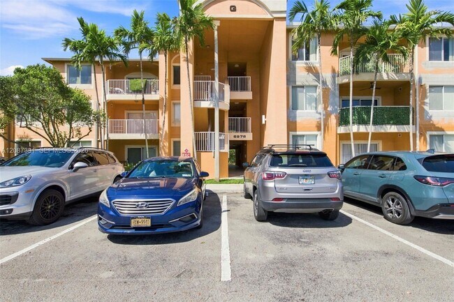 Building Photo - 6976 SW 39th St Unit G304