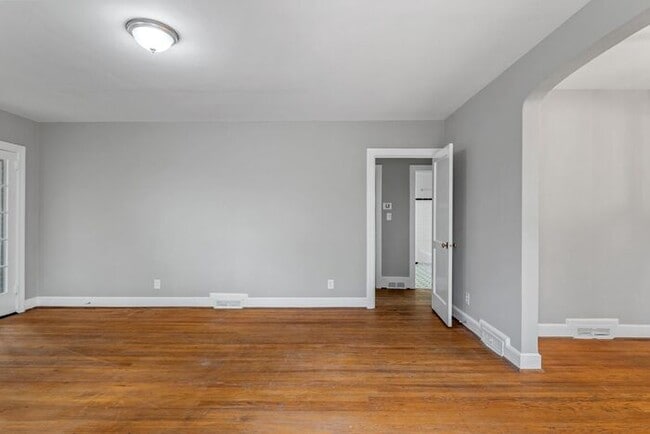 Photo - Brick home, Two Story, Hardwoods, DR, 2 Sun Rooms, FP, Carport!.