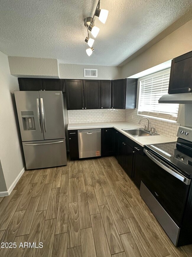 Building Photo - 1222 E Harry St Unit B Rental
