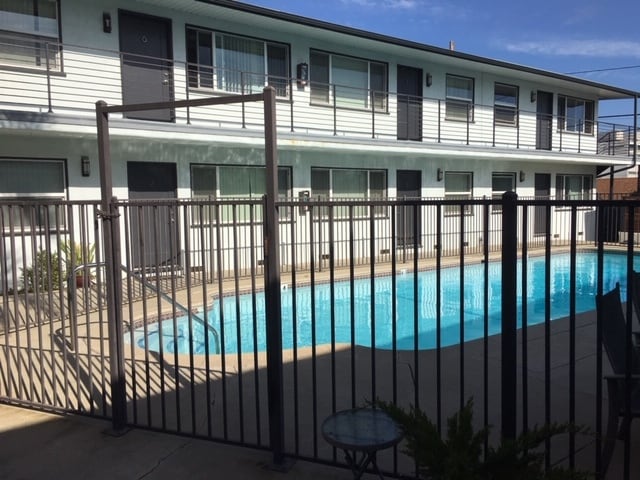 Poolside entrance - 1754 E Sycamore Ave Apartments Unit C