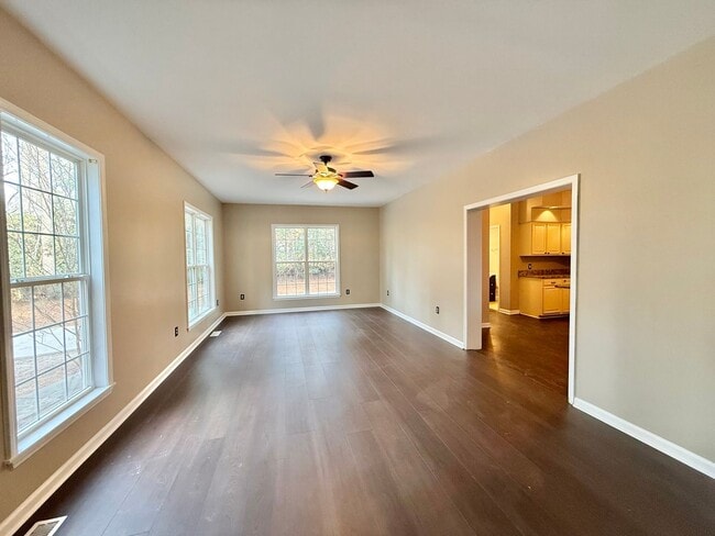 Photo - Private 4BD, 2.5BA Fuquay Varina Home on a Large Lot with a Fenced Yard and First Floor Master Be...