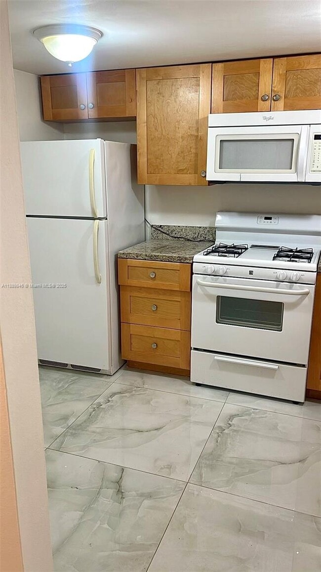 Building Photo - 18111 NW 68th Ave Unit H210