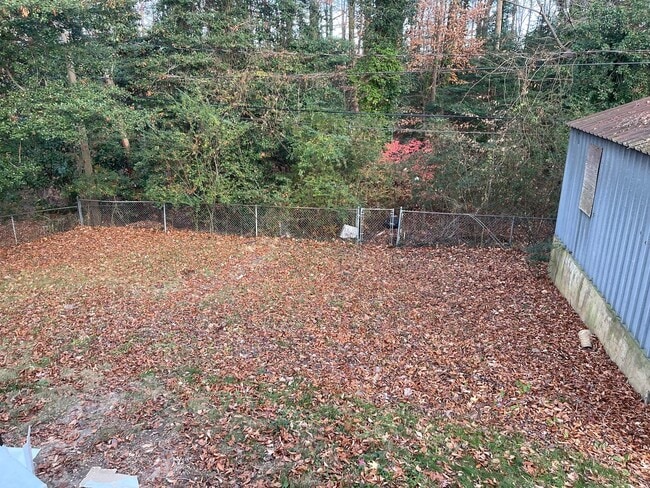 Photo - 3bed house in the county! Central all electric hvac, laundry, yard and hardwoods.