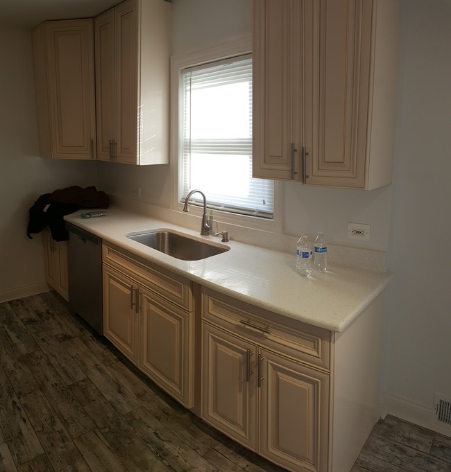 Kitchen with Stainless steel appliances which includes a side by side ref microwav with dishwasher - 900 Dunlop Ave Apartment Unit 1st