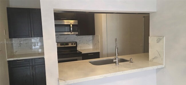 Photo - 900 NE 209th Terrace Unit 203-31
