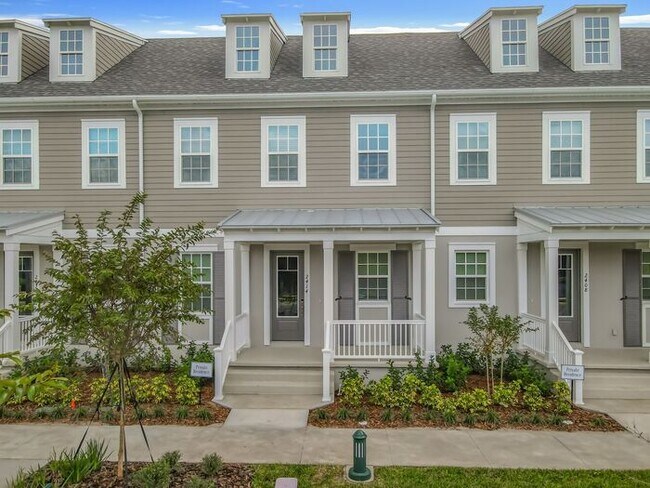 Photo - New Luxury Townhome in Celebration with All porcelain tiled floors. Island Village new construction