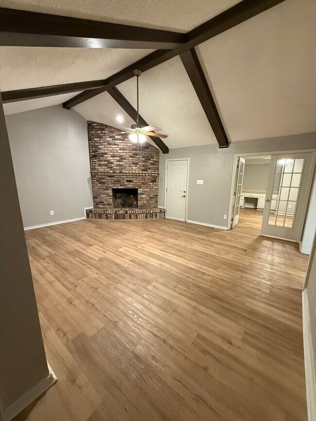 Photo - Spacious 4-Bedroom Home with Office, Fireplace & Pet-Friendly Living