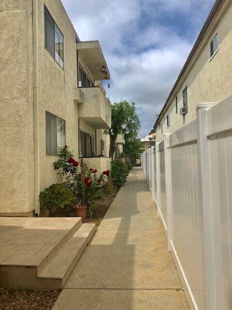 Walkway to Units - View from Front of Building - 3739 Clarington Ave Apartments Unit 26