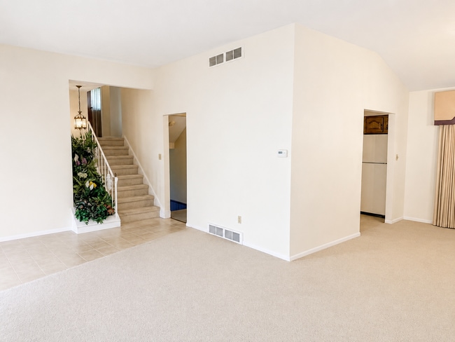 Photo - Spacious 3-Bedroom Split-Level with Formal Dining Room, Fireplace, and Fenced Backyard