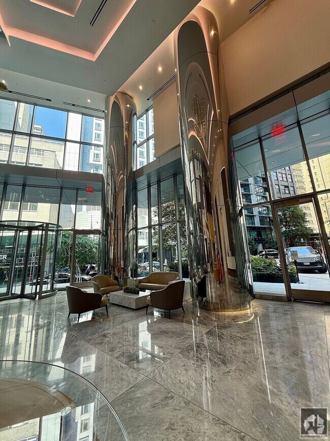 Building Photo - SUNNY NO FEE STUDIO IN THE LUXURY SUMMIT NYC Unit 40D Rental