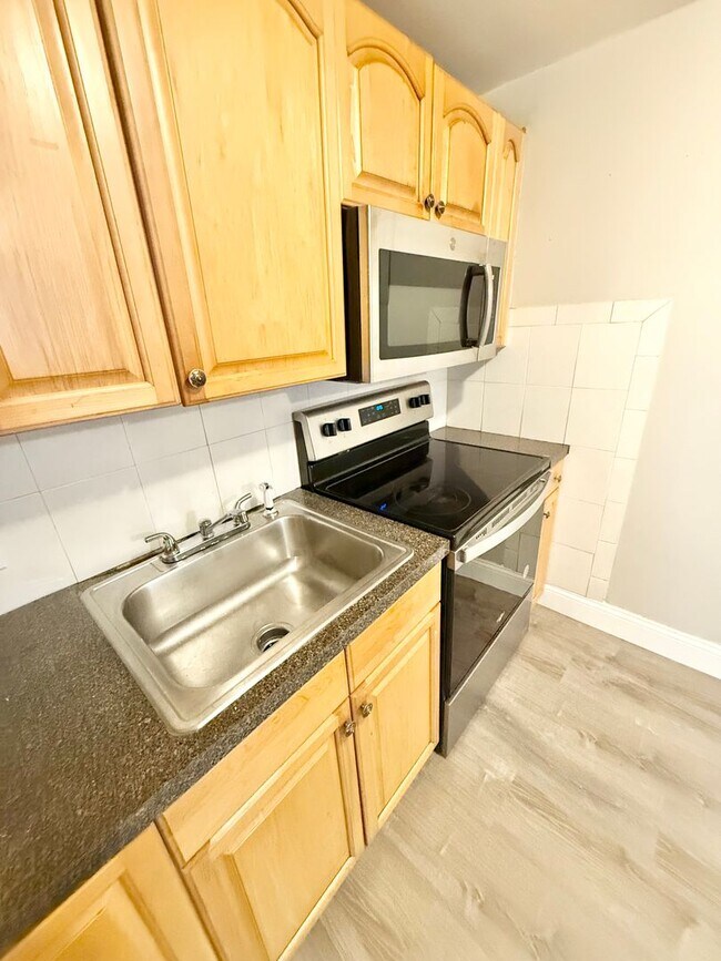 Photo - Newly Renovated 2 Bedroom with Off-Street ...