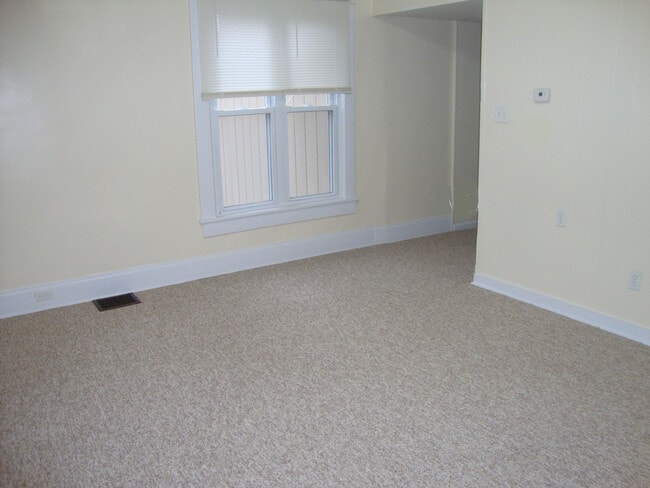 Living room from front door. - 522 E Market St Apartments Unit 522