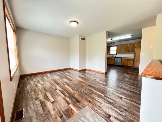 Photo - Spacious 3BR Duplex with Finished Basement & 2-Car Garage in Otsego Unit 1389